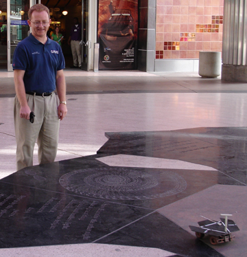 Steve Bartlett overseeing the use of the Mars Rover model.