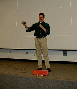Photo of speaker Rex Ridenoure with rocketcam device.