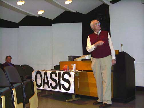 Dr. James Woodward speaking at March, 2003 meeting at Cal State Fullerton.