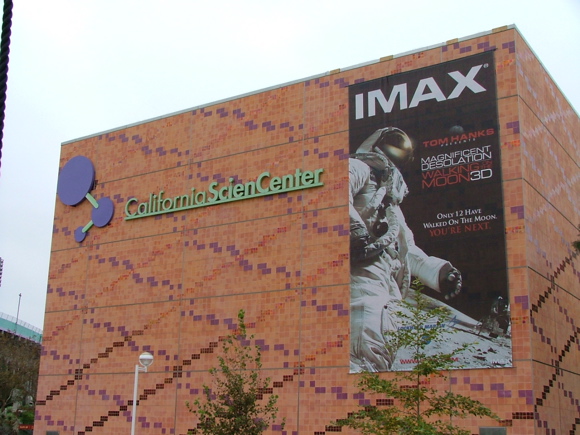 IMAX theater of the California Science Center with poster of Magnificant Desolation movie.