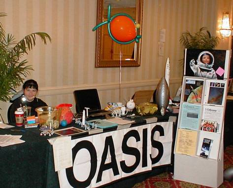 Lisa Kaspin at the OASIS Information table at LosCon.
