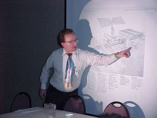 Steve Bartlett making a presentation about the International Space Station