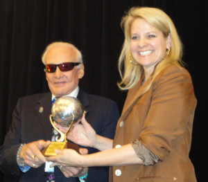 Buzz Aldrin presents the Space Pioneer Award for Entrepreneurial Business to Gwynne Shotwell