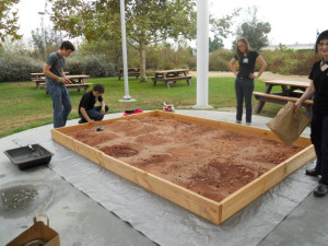 Mars Day volunteers setting up the activity: Driving a rover across Mars.