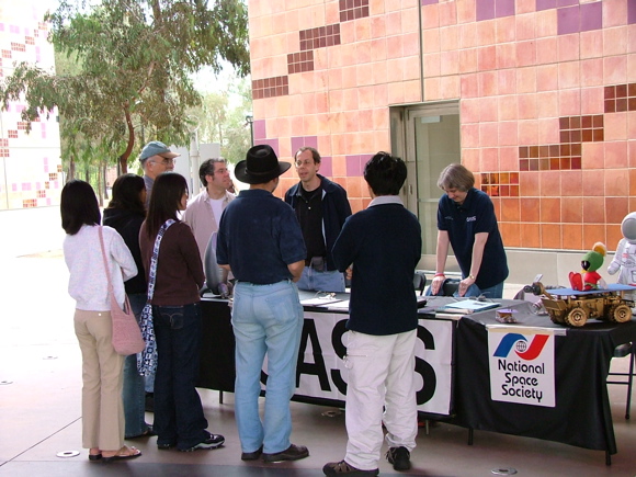Visitors at the OASIS table.