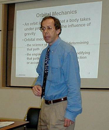 Seth Potter presenting lecture on Orbital Mechanics
